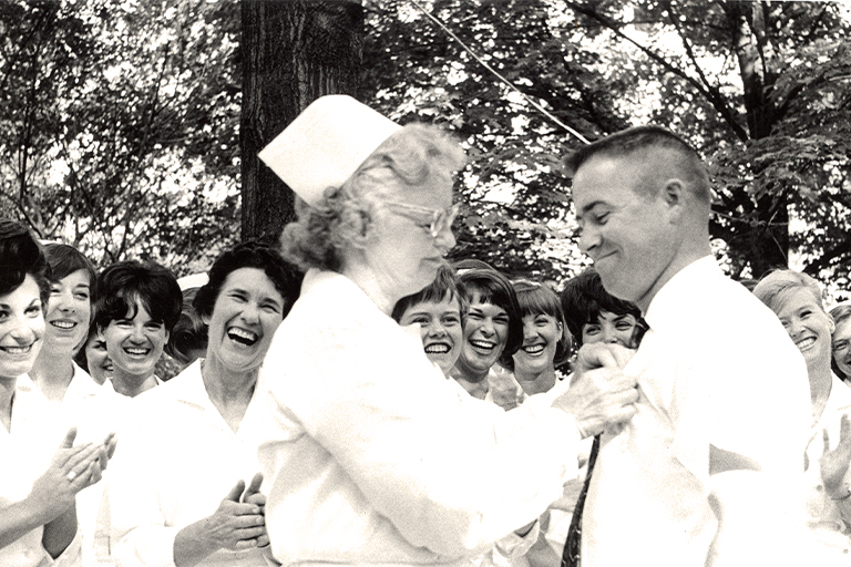 John Foster receiving a pin