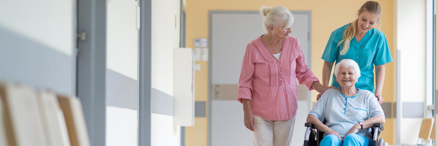 Nurse with patient and family member