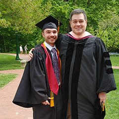 Two men in graduation robes