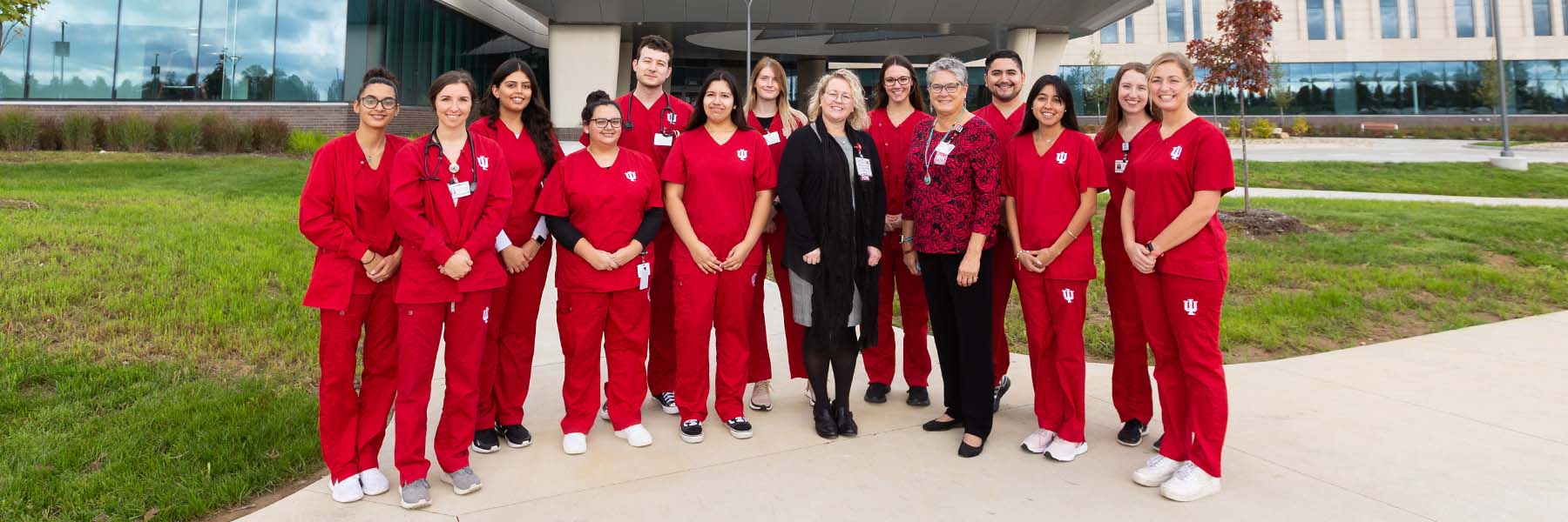 IU Bloomington nursing students and faculty stand in front of the IU Health Bloomington Regional Academic Health Center