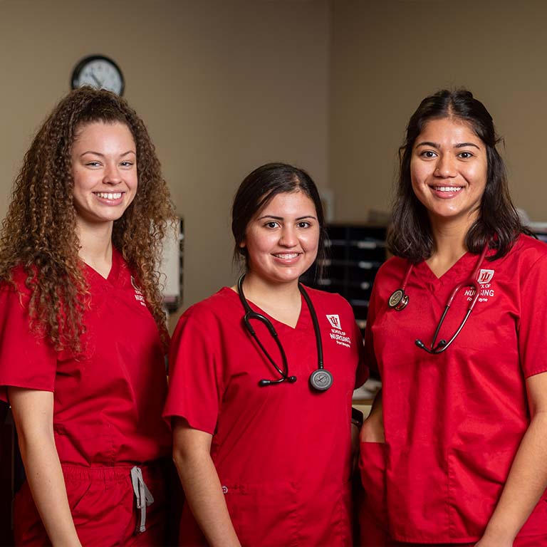 Three IU Fort Wayne nursing students pose for a photo at the Lafayette Street Family Health Clinic