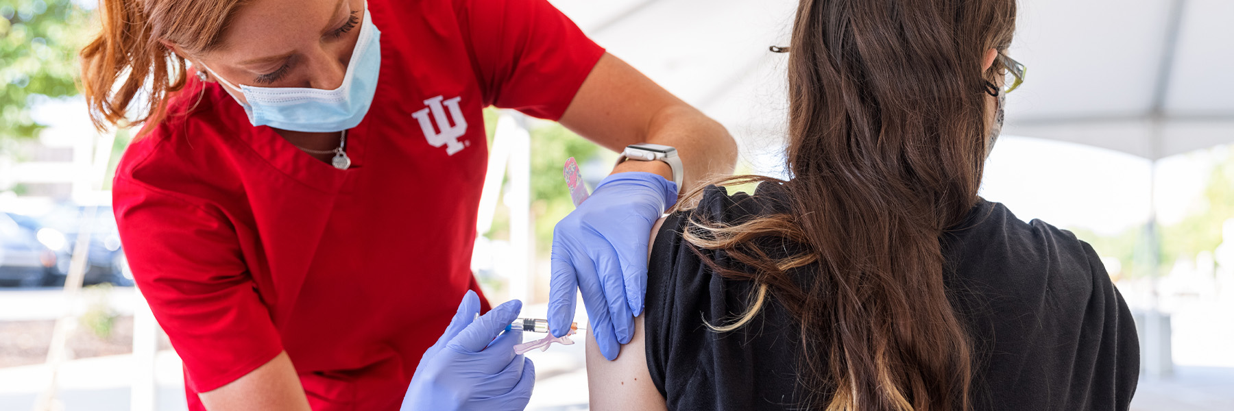 Nursing student at an immunization clinic