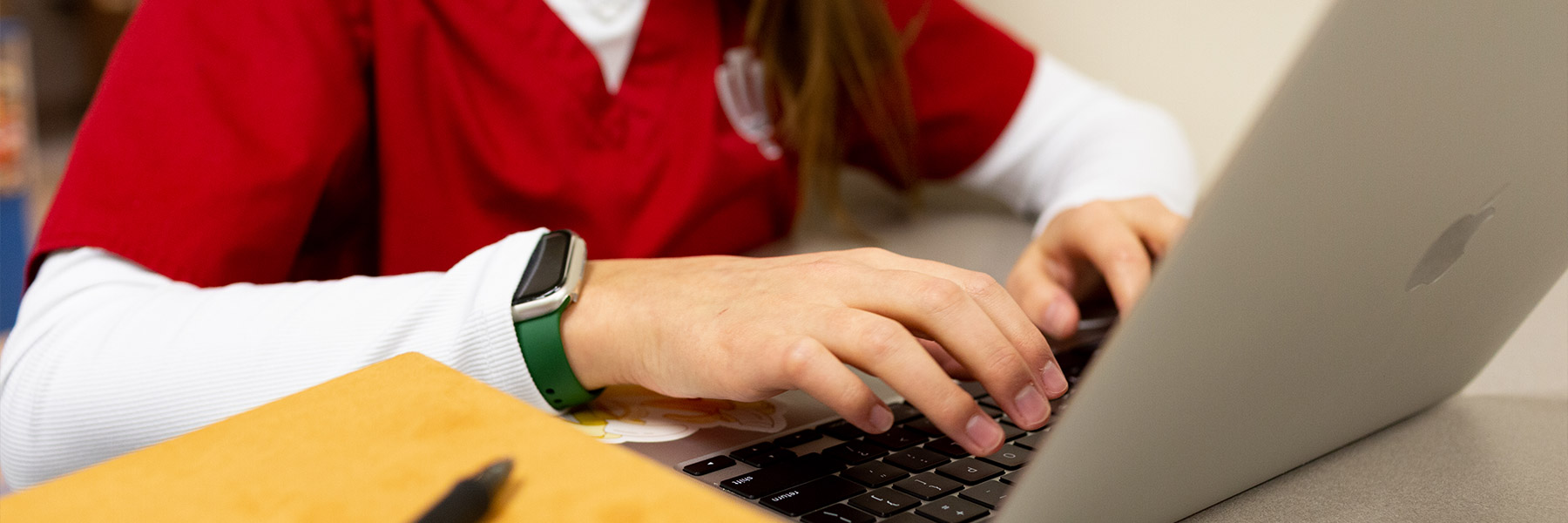 Nursing student using laptop