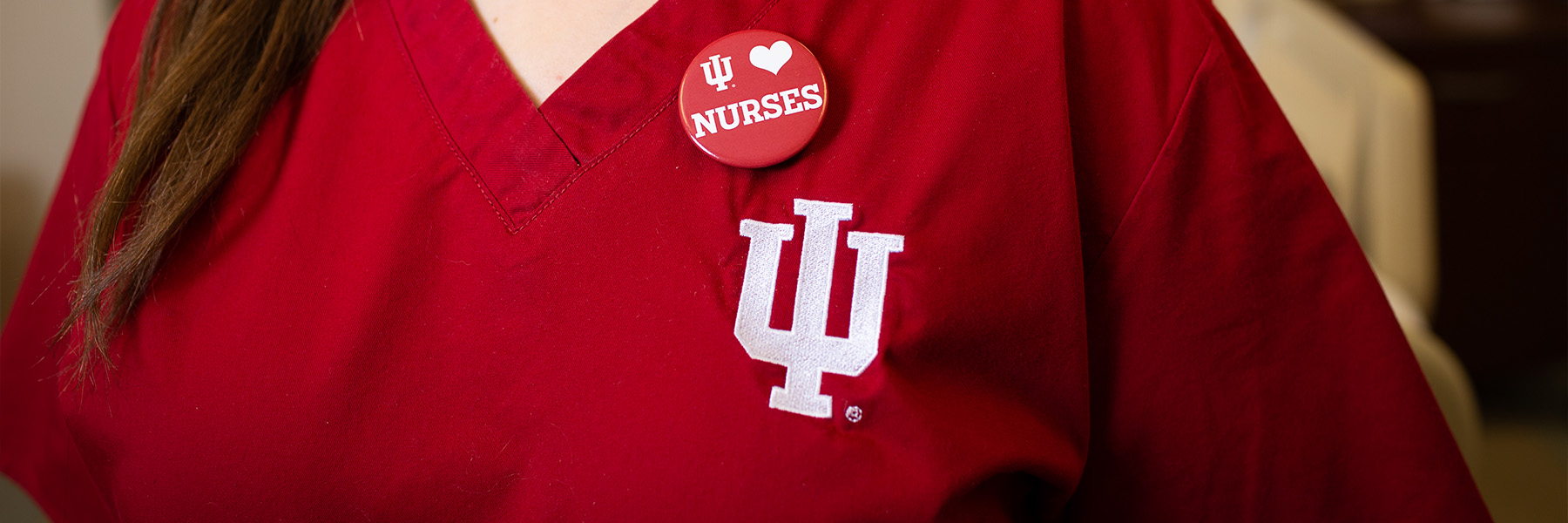 Close up of IU Nursing uniform with I Love Nurses pin