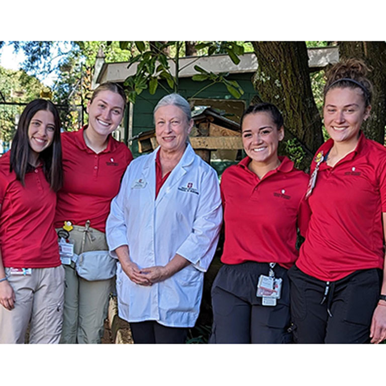 IU School of Nursing's Dr. Bethany Murray and nursing students pose for a photo during a study-abroad opportunity in Kenya IU School of Nursing's Dr. Bethany Murray and nursing students pose for a photo during a study-abroad opportunity in Kenya