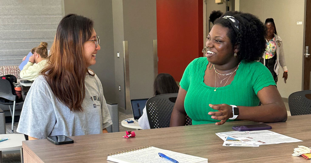 Senior nursing students Serin Kang and Tomi Abegunde chat in the student lounge during the first week of the new academic year