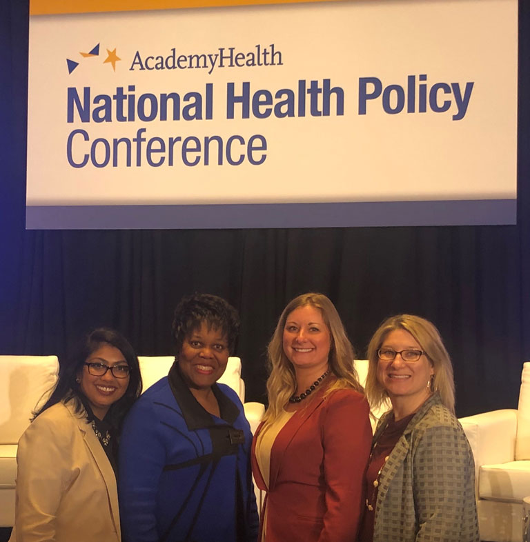 Eagles alumni pose for a photo with IU School of Nursing's Dr. Sharron Crowder during an AcademyHealth National Health Policy Conference.