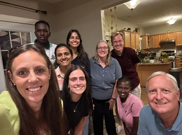 A group photo including IU School of Nursing faculty and staff and Moi University students Victor Kiplagat and Olivia Watta.