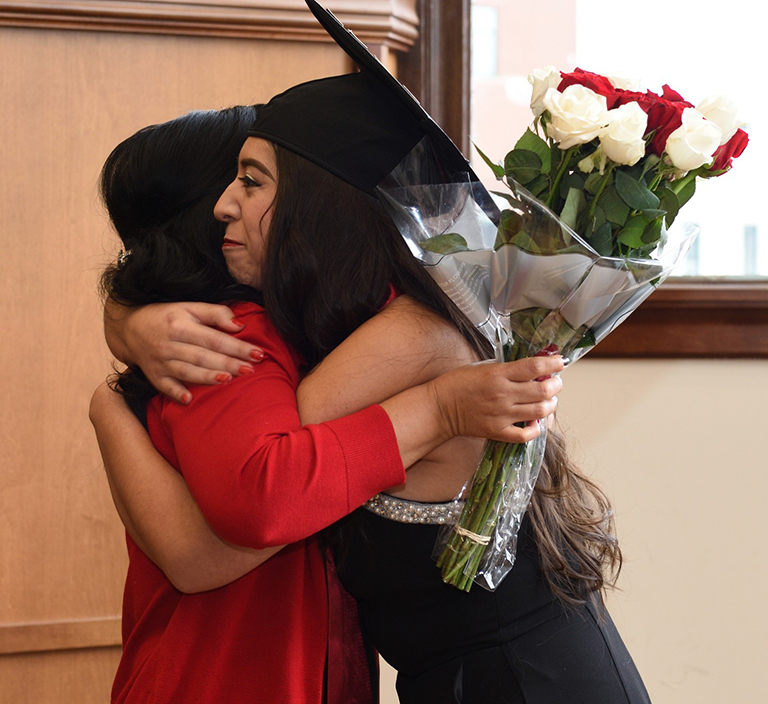 Two women hugging