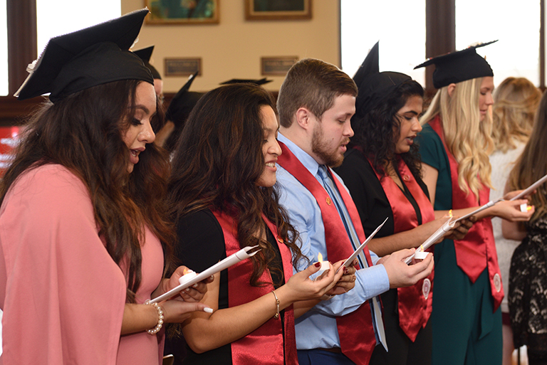 Graduates recite nursing pledge