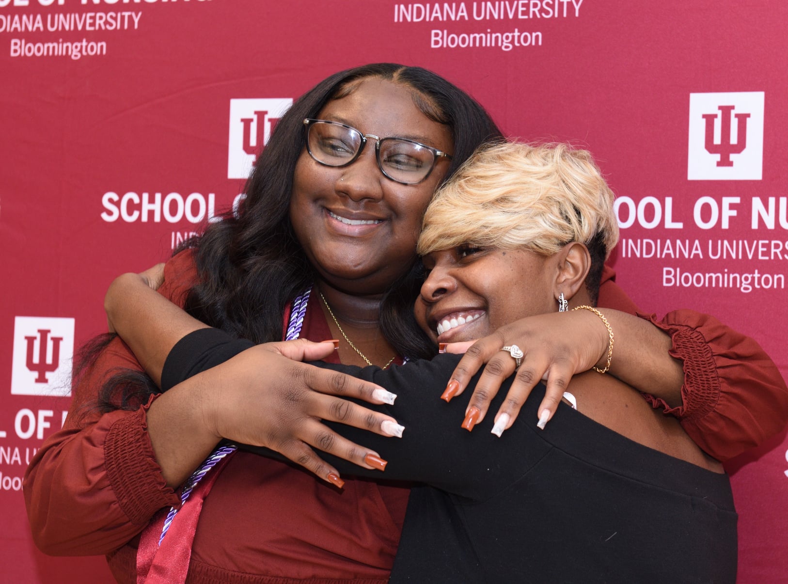 Two women hugging