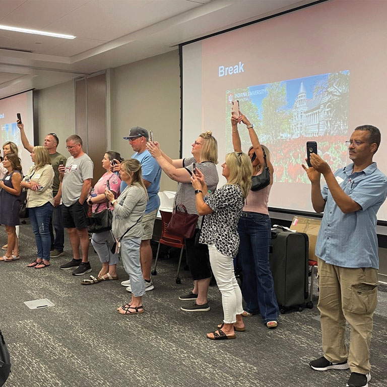 Parents taking photos at new student orientation